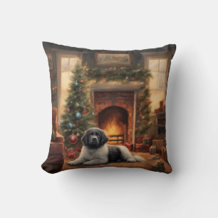 Hond die voor een kerstboom zit kussen