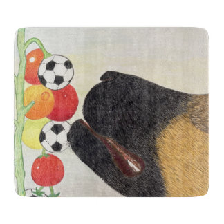 Hond en tomaten snijplank