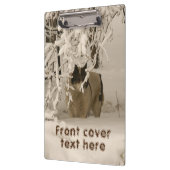 Hond in de winter klembord (Links)