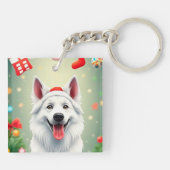 Hond poseert tussen feestelijke kerstdecoraties sleutelhanger (Achterkant)