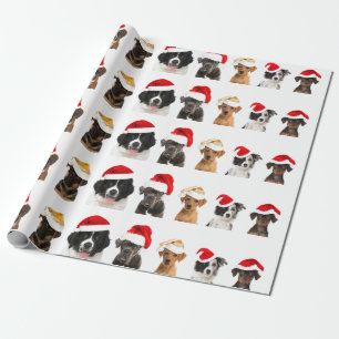 Honden in kerstpapier voor kerstcadeautjes cadeaupapier