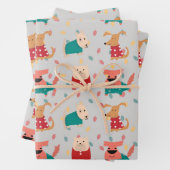 Honden in kersttrui inpakpapier vel (In situ)