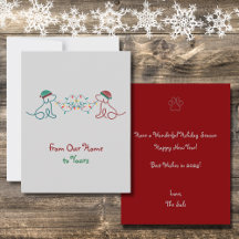 Honden spelen met kerstverlichting