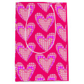 Hondenpootafdrukken en roze hartenpatroon medium cadeauzakje (Voorkant)