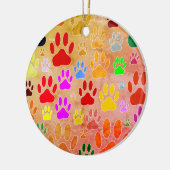 Hondenpootafdrukken op  achtergrond keramisch ornament (Links)