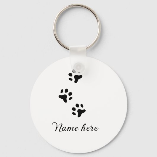 Hondenpootje zwart huisdier naam tekst dierenpootj sleutelhanger (Voorkant)