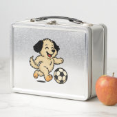 Hondje speelt voetbal (In situ)