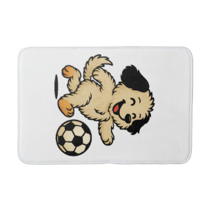 Hondje speelt voetbal badmat