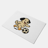 Hondje speelt voetbal deurmat (Schuin)