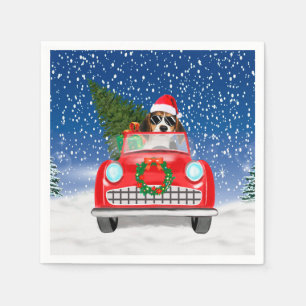 Hondsdolle hond rijdt auto in sneeuw met Kerstmis Servet