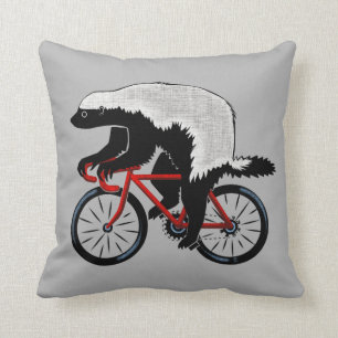 Honingbadger op een fiets kussen