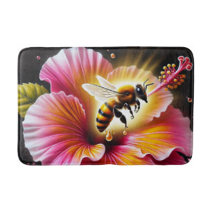 Honingbij bestuift een bloeiende heldere hibiscus badmat