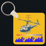 Honor in every thread light orange yellow sleutelhanger<br><div class="desc">**Honor in Every Thread** art design depicts a powerful scene of an American military helicopter deploying soldiers onto the battlefield while brave troops salute in respect to veterans. Symbolizing courage, duty, and national pride, the artwork celebrates the sacrifice and strength of heroes, transforming products into meaningful tributes to service and...</div>