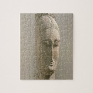 Hoofd van een vrouw (steen) legpuzzel