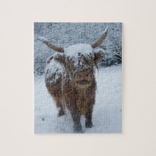 Hooglandenkool in de sneeuw legpuzzel