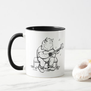 Hooglandkoe speelt akoestische gitaar mok