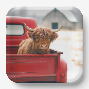 Hooglandrund in een rode retro-pick-uptruck papieren bordje