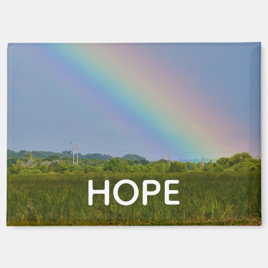 HOPE magnet with image of a rainbow over a field (Voorkant)