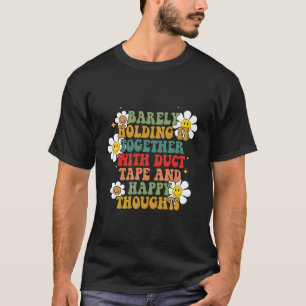 Houd het in de nabijheid van een tapeband en een H T-shirt