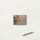 houten achtergrond met dennenappels post-it® notes (Op bureau)