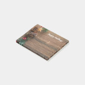 houten achtergrond met dennenappels post-it® notes (Schuin)