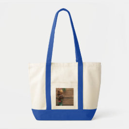 houten achtergrond met dennenappels       tote bag