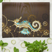 Houten achtergrond met mechanisch zeepaard theedoek (Gevouwen)