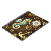 Houten achtergrond met mechanisch zeepaardje notitieboek (Linkerzijde)