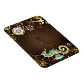 Houten achtergrond met mechanische zeepaard magneet (Rechterzijde)