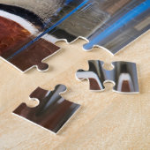 Houten eend in een vijver legpuzzel (Zijkant)