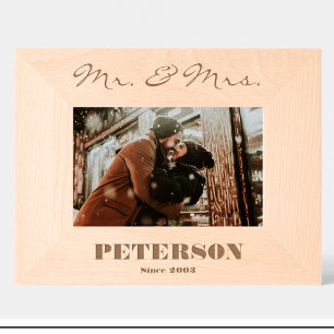 Houten fotolijstjes op maat voor koppels met menee gegraveerde lijstjes