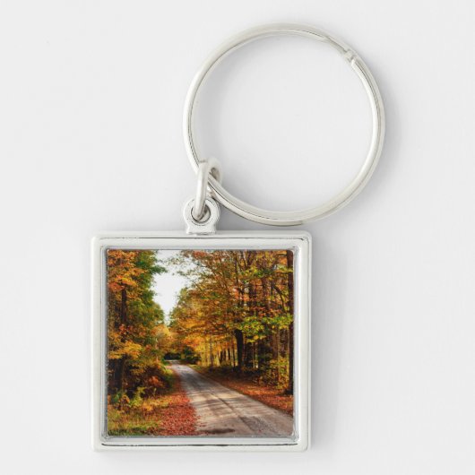 Houten pad met herfstloof sleutelhanger (Voorkant)