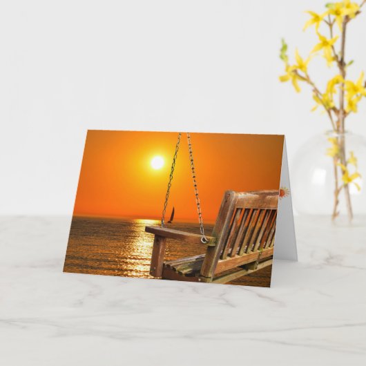 houten schommel met zonsondergang over meer scène kaart (Gele Bloem)