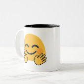 Hugging Emoji Tweekleurige Koffiemok (Voorkant links)