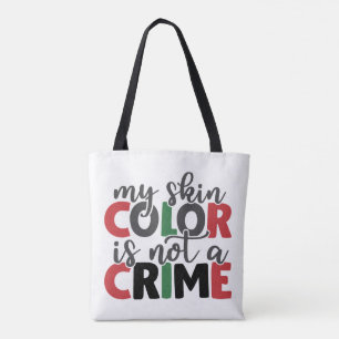 Huidkleur geen misdaad tote bag