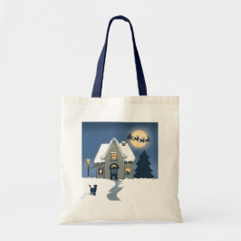 Huis met kat op een besneeuwde kerstnacht tote bag