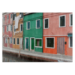 Huizen aan het water snijplank