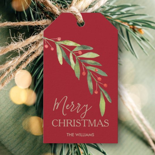 Hulst en bessen op rood vrolijk kerstfeest cadeaulabel