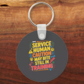 Human Caution Service May Still Bite Training Smil Sleutelhanger (Voorkant)
