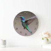 Hummingbird in vlucht grote klok (Huis)