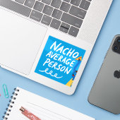 Humorous "Nacho Average Person" Food Pun Sticker (Laptop met iPhone)