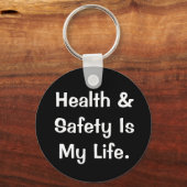 Humoureus gezondheids- en veiligheidsprijs sleutelhanger (Voorkant)