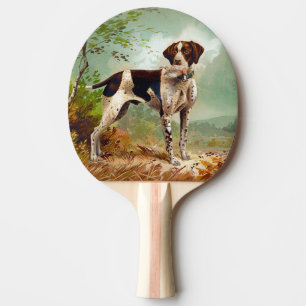 Hunter dog met vogel in de mond tafeltennisbatje