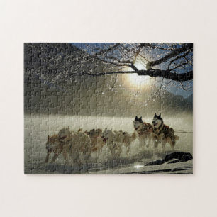 Huskies in de sneeuw legpuzzel