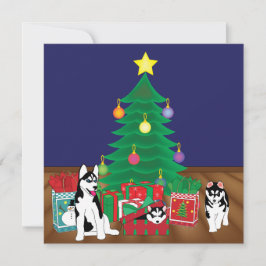 Huskies spelen onder de kerstboom Kaart