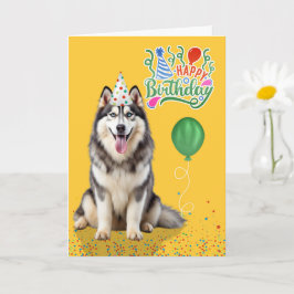 Husky-hond in een feesthoed op gele verjaardag kaart