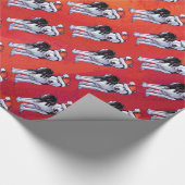 Husky in Santa Hat op Red Cadeaupapier (Hoek)