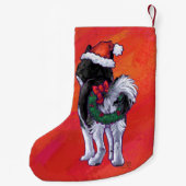 Husky in Santa Hat op Red Kleine Kerstsok (Achterkant)