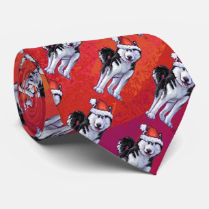 Husky in Santa Hat op Red Stropdas