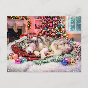 Husky slaapt in gezellige kerstscene briefkaart